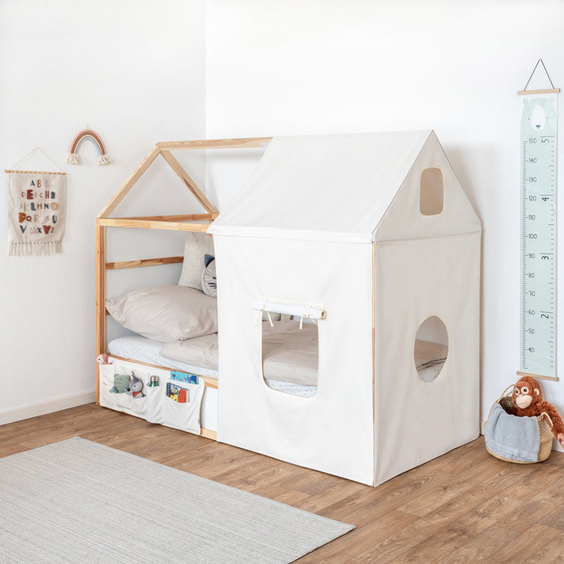 IKEA Kura Hausbett mit entsprechenden Stoffvorhängen.