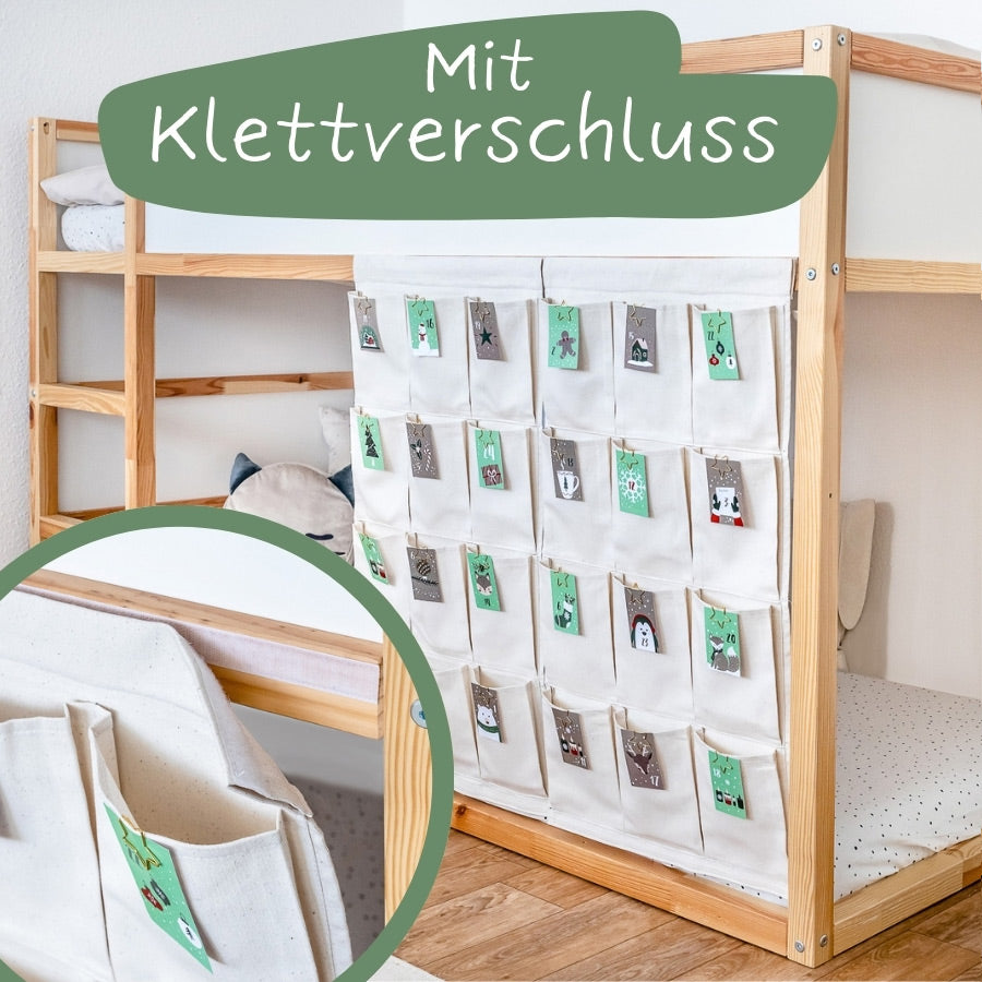 2 Vorhänge mit jeweils 12 Taschen, die an der Seite vom IKEA Kura Kinderbett hängen und so als Adventskalender genutzt werden.