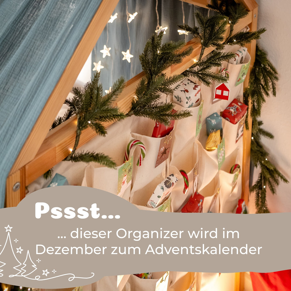 Kura Aufbewahrung mit 24 Taschen als Adventskalender.